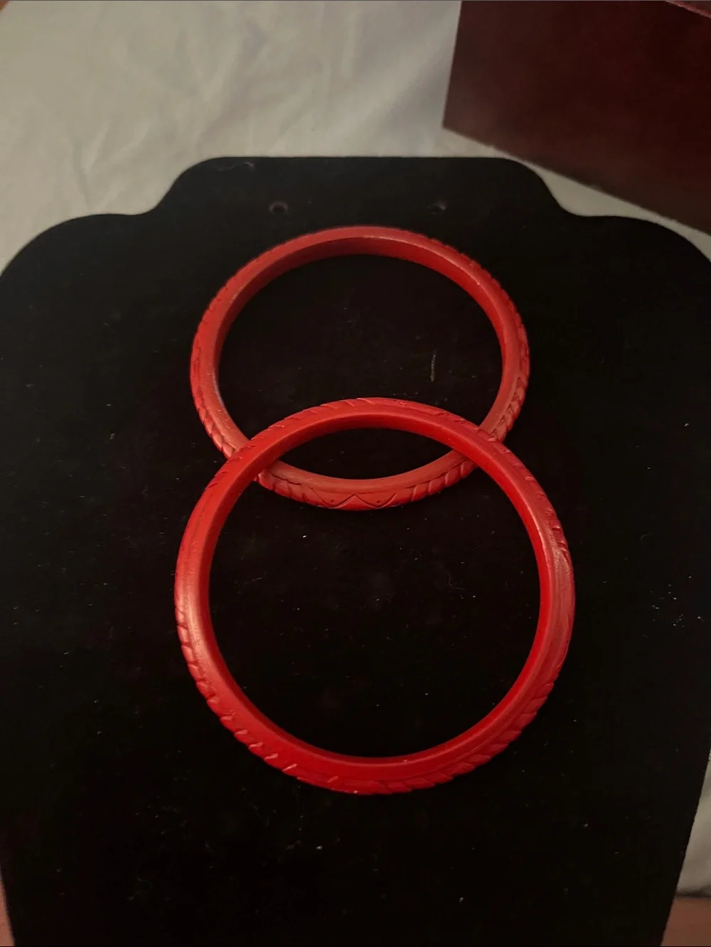 This is a vintage Chinese carved red cinnabar lacquer bangle bracelet